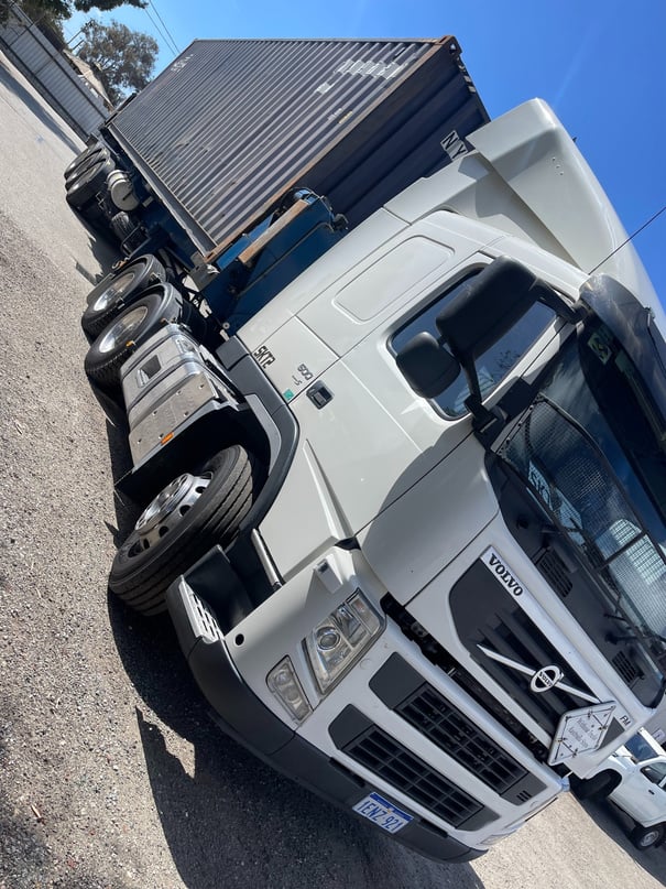 Freight service, container transport, side lifter.